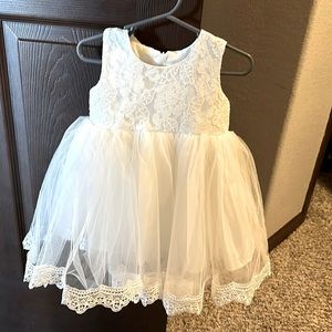 White beautiful dress. Only worn once for her baptism. Size is 12 months.